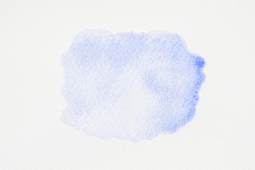 Abstract light blue watercolor on paper texture
