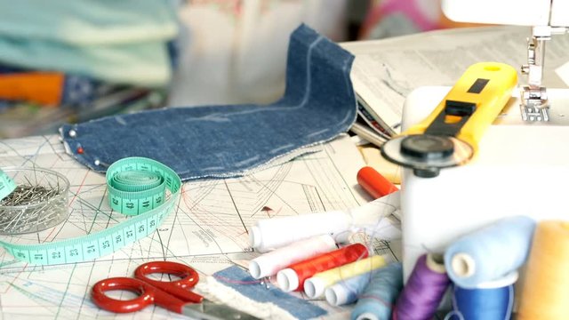 View of seamstress's messy table and equipment
