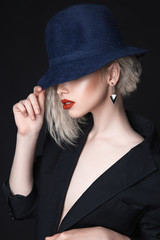 young woman in hat