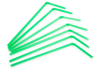 Green drinking straws on white background