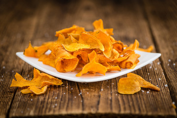 Portion of Sweet Potato Chips , selective focus