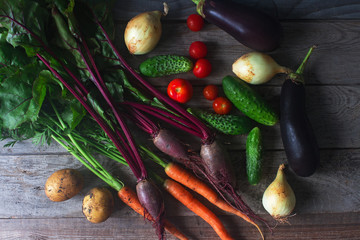 Various organic vegetables on rustic wooden background, healthy lifestyle, autumn harvest, raw...