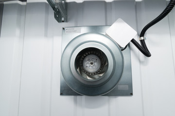 Industrial fan on the wall of a power plant