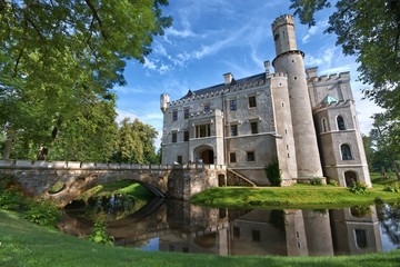 Neo-Gothic style castle surrounded by a moat in Karpniki, Poland © Mariusz Świtulski