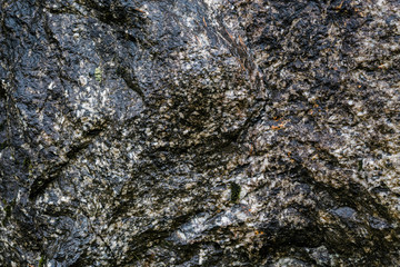 A wet rock wall texture background image