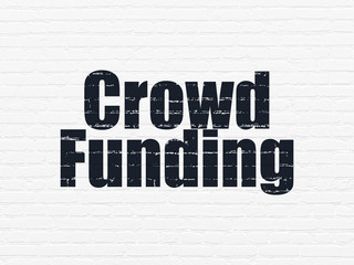 Finance concept: Crowd Funding on wall background