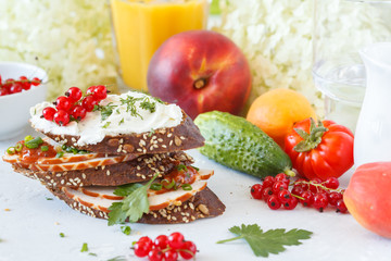 Sandwiches with ham and curd cheese for breakfast