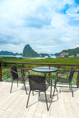 Table and chair over beautiful at Samed Nang she in Phang Nag bay,southern of Thailand.