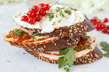 Sandwiches with ham and curd cheese for breakfast