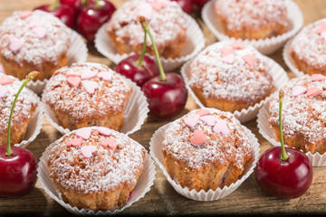 Cupcakes, muffins on a wooden table