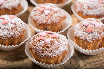 Cupcakes, muffins on a wooden table