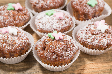 Cupcakes, muffins on a wooden table