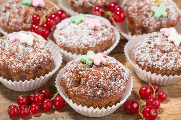 Cupcakes, muffins on a wooden table