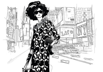 Fashion girl on a street background.