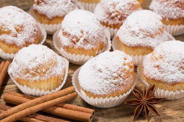 Cupcakes, muffins on a wooden table