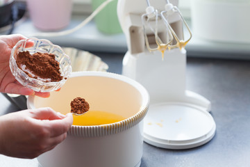 Baking cake. Next stages, following stages. We add cocoa