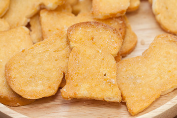 Crispy Garlic Bread on wooden plate
