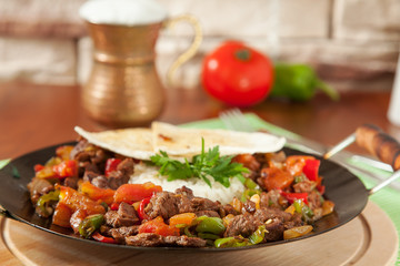 Meat Saute Turkish Et sote with wooden table - Hair Pie Meat - Sac Tava