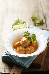 Meatballs in tomato and sour cream sauce