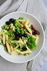 Pasta with salami and vegetables