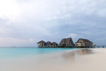 Wooden huts at dawn.