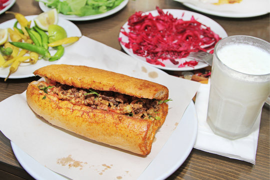 Traditional Turkish cuisine, Tantuni with loaf bread and ayran (yogurt drink).