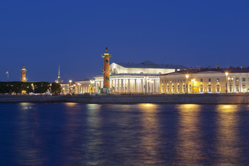 Fototapeta na wymiar Summer night view on the Stock Exchange and the Rostral columns in St. Petersburg, Russia