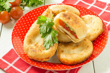 Delicious vegetable pies with tomatoes and cheese