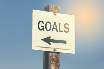 Goals word and arrow signpost 3