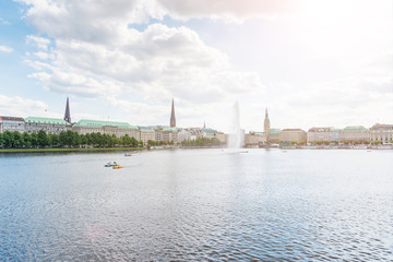 Binnenalster Lake with fountain in Hamburg, Germany under sunny sky