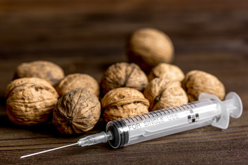 concept food allergies on wooden background