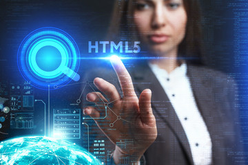 The concept of business, technology, the Internet and the network. A young entrepreneur working on a virtual screen of the future and sees the inscription: HTML5