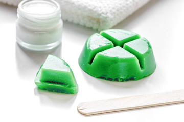 wax for depilation on white background