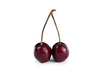 Fresh ripe cherries on white background
