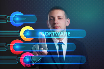 Fototapeta na wymiar Business, Technology, Internet and network concept. Young businessman working on a virtual screen of the future and sees the inscription: Software