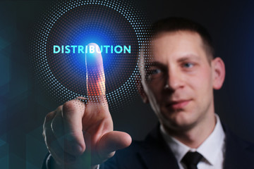 Business, Technology, Internet and network concept. Young businessman working on a virtual screen of the future and sees the inscription: Distribution