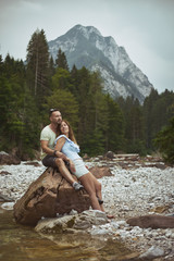 Naklejka premium Young lovers dating in the Alps
