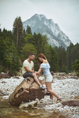Naklejka na ściany i meble Young lovers dating in the Alps