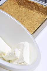 Cottage cheese and chopped cookies. Basis for the tender cheesecake.