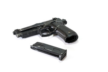 Air soft gun with magazines isolated on white background.