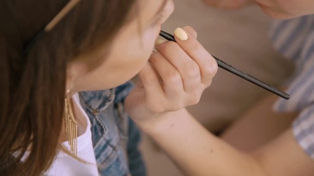 Fashion make-up for pretty little model in 4K