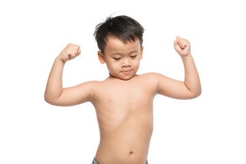 Adorable boy showing off with his muscles, isolated on white background