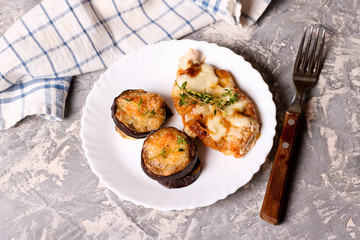 Roast chicken fillet and vegetables with cheese and thyme