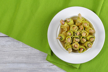 zucchini rolls stuffed with herring slices