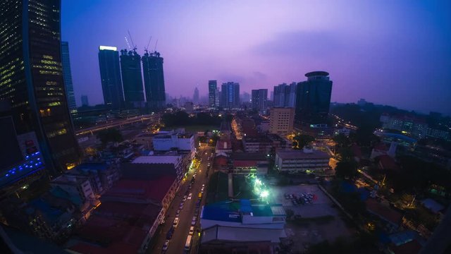 Night to day timelapse of the city of Kuala Lumpur. Wide Angle