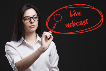 The concept of business, technology, the Internet and the network. A young entrepreneur working on a virtual screen of the future and sees the inscription: Live webcast