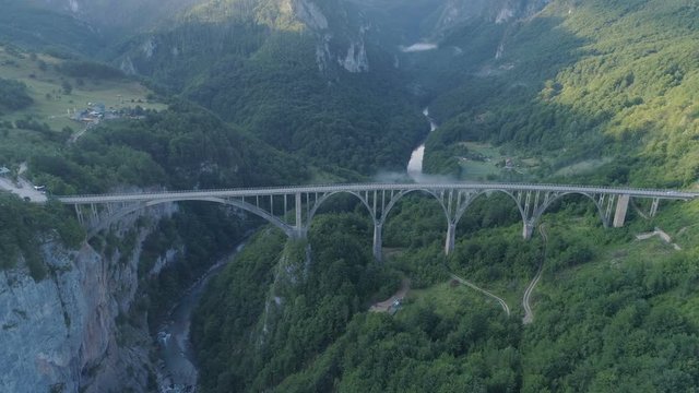Aerial view of Durdevica Tara arc bridge in the mountains, One of the highest automobile bridges in Europe.