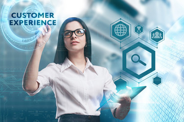 The concept of business, technology, the Internet and the network. A young entrepreneur working on a virtual screen of the future and sees the inscription: Customer experience
