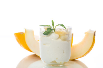 Homemade yogurt with slices of ripe melon