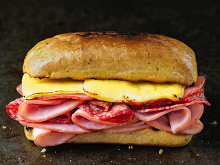 rustic deli cold cuts sandwich